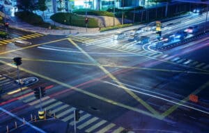 Image shows a large multi lane intersection with traffic lights and vehicles moving in several directions, demonstrating the traffic conditions that can lead to intersection accidents in Murfreesboro.