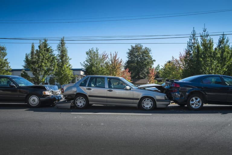 Image is of multiple vehicles involved in a roadway collision, concept of a chain reaction accident in Murfreesboro.